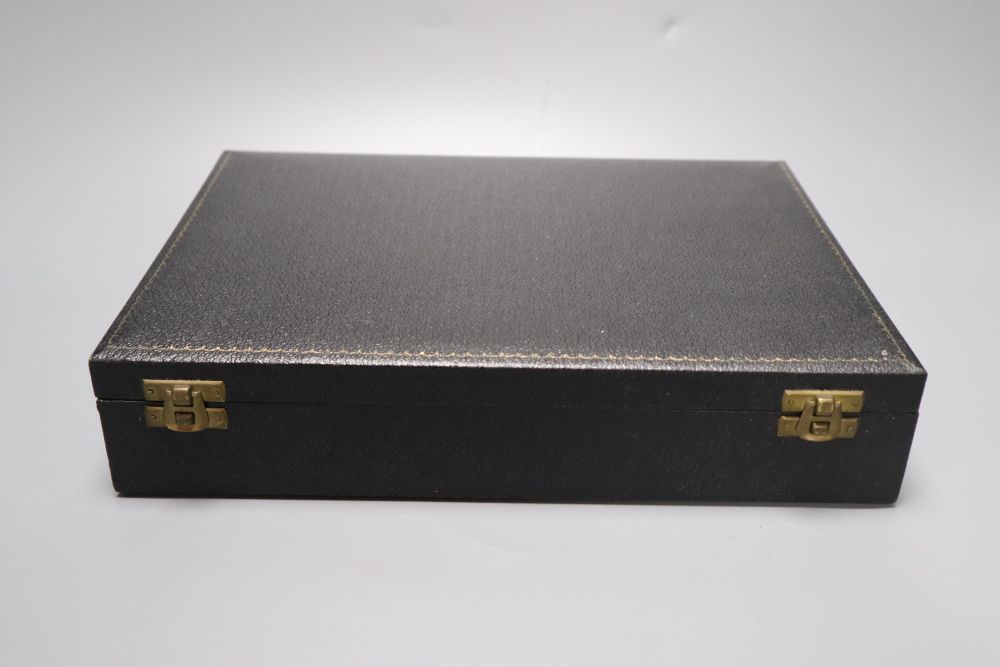 A three piece silver plated translucent enamelled dressing table set, cased
